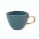 Start je dag heerlijk ontspannen met de Good Morning Cup van Urban Nature Culture. Hoe vroeg je ochtend ook is, elke Good Morning Cup brengt een glimlach op je gezicht. De mok is gemaakt van porselein en heeft een mooie organische vorm met een handgeschilderd gouden oortje.
